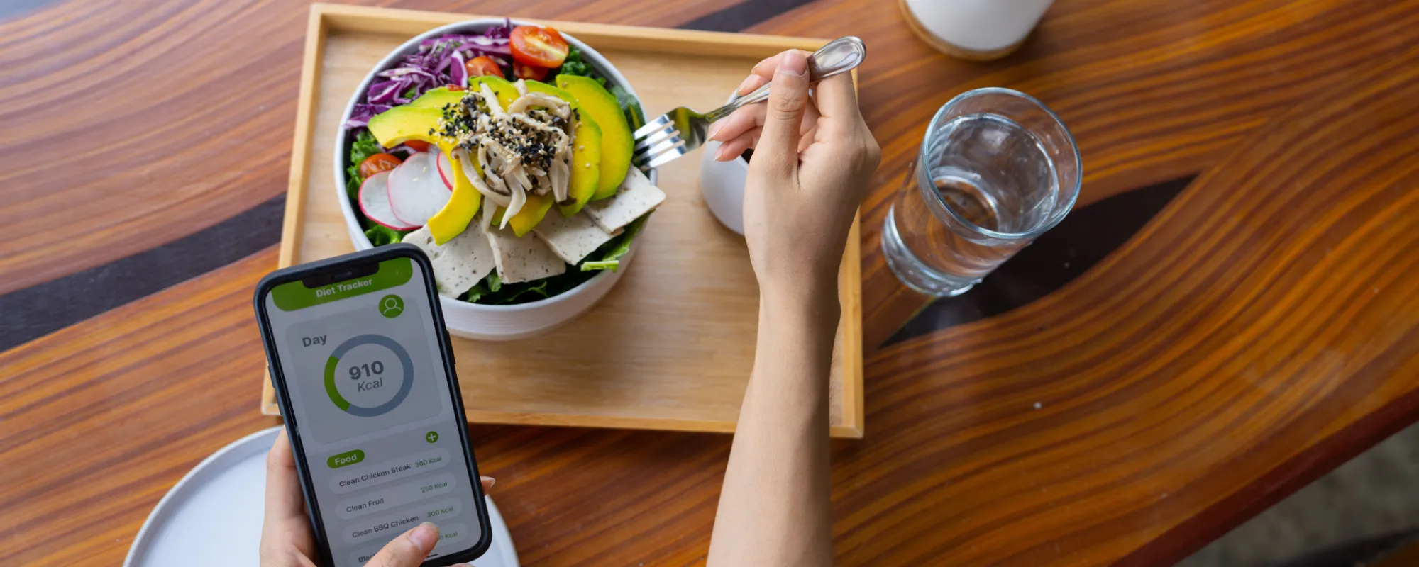 Wooden cutting board with sliced vegetables and herbs